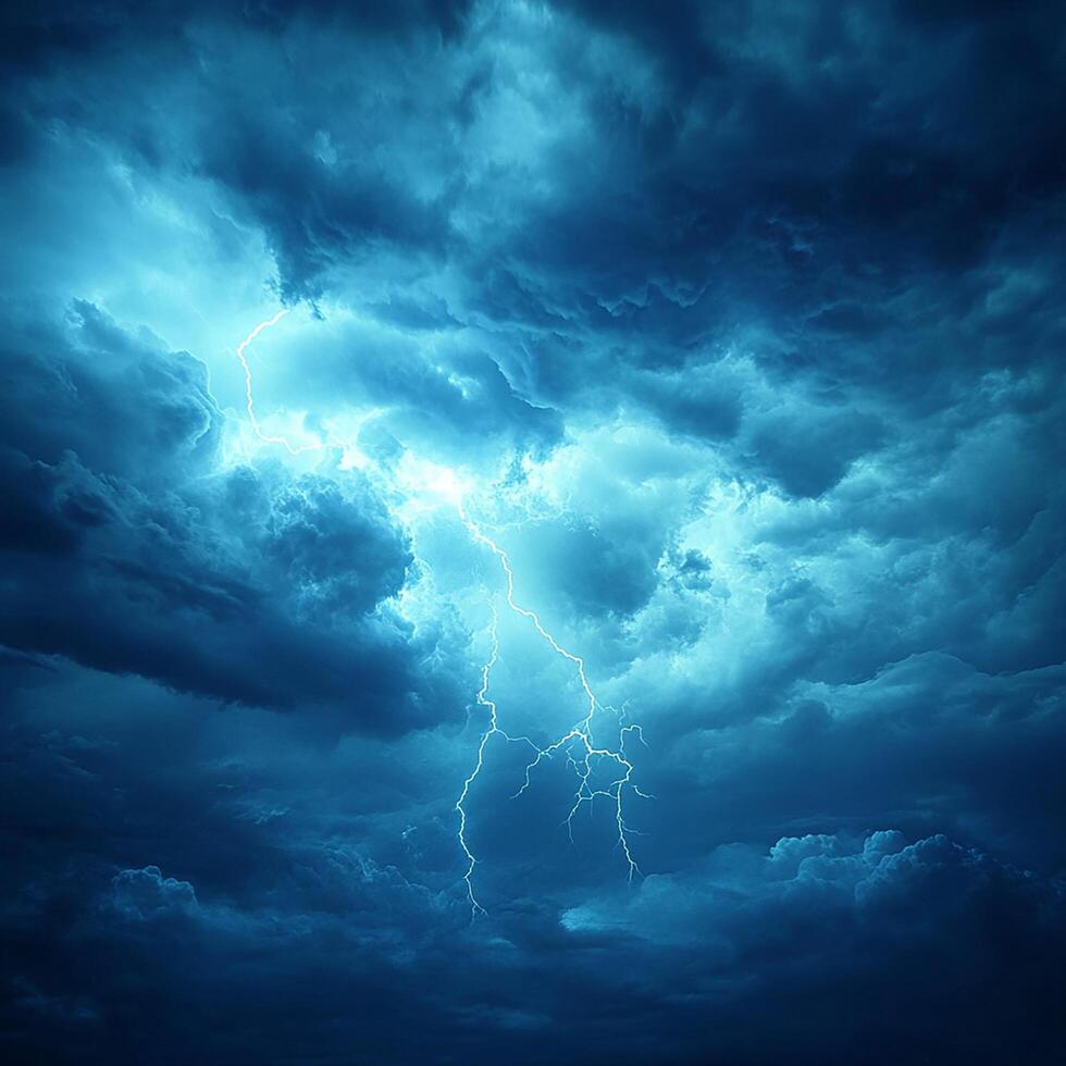 Dramatic storm clouds illuminated by bright flashes of lightning. photo