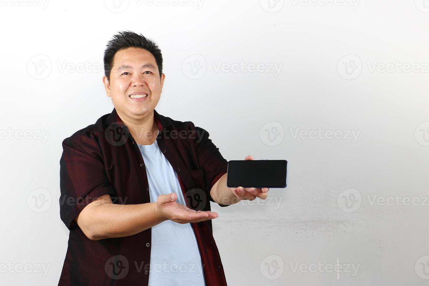 Man Showing Smartphone Screen photo