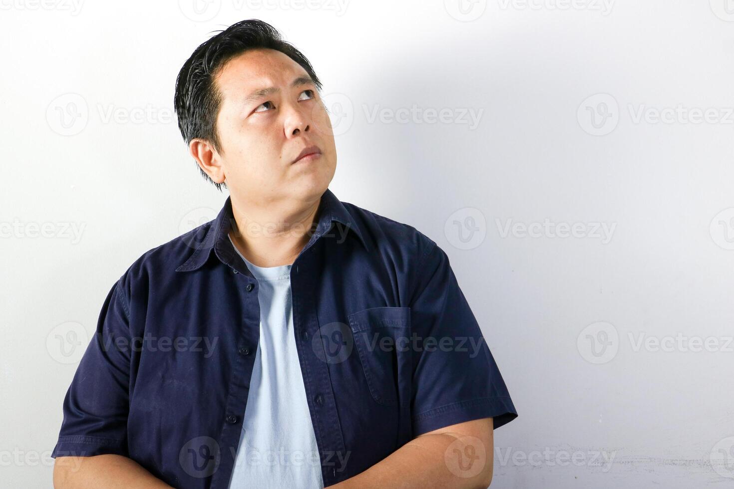 Pensively Thinking Man, face looking up.Consider something photo