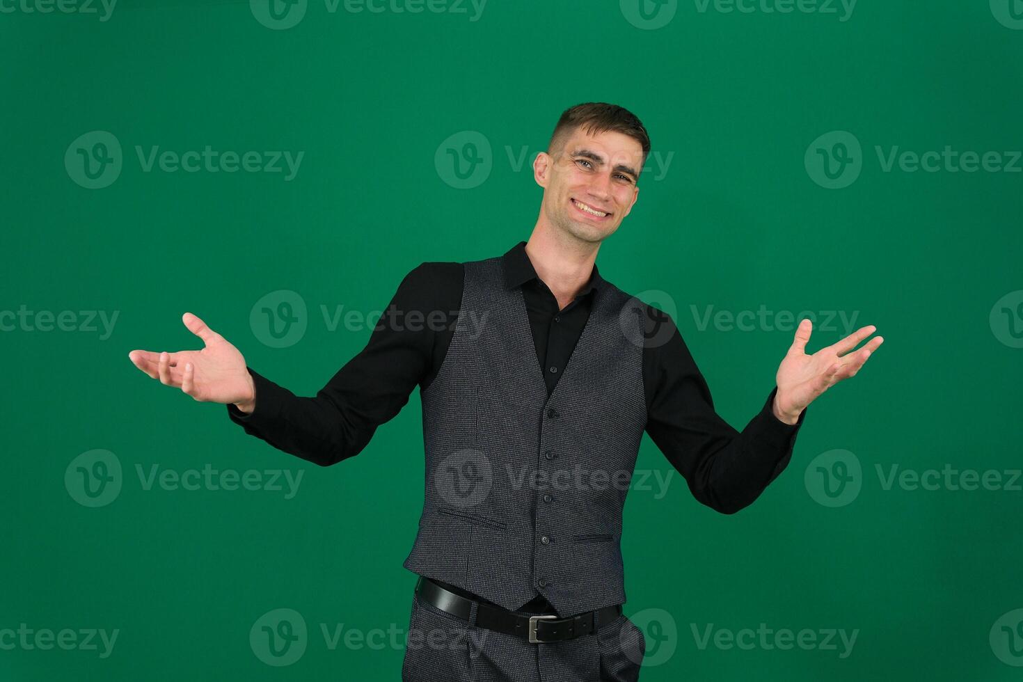 Photo of amazing guy indicating fingers up to empty space advising cool low shopping prices wear casual denim shirt isolated green color background