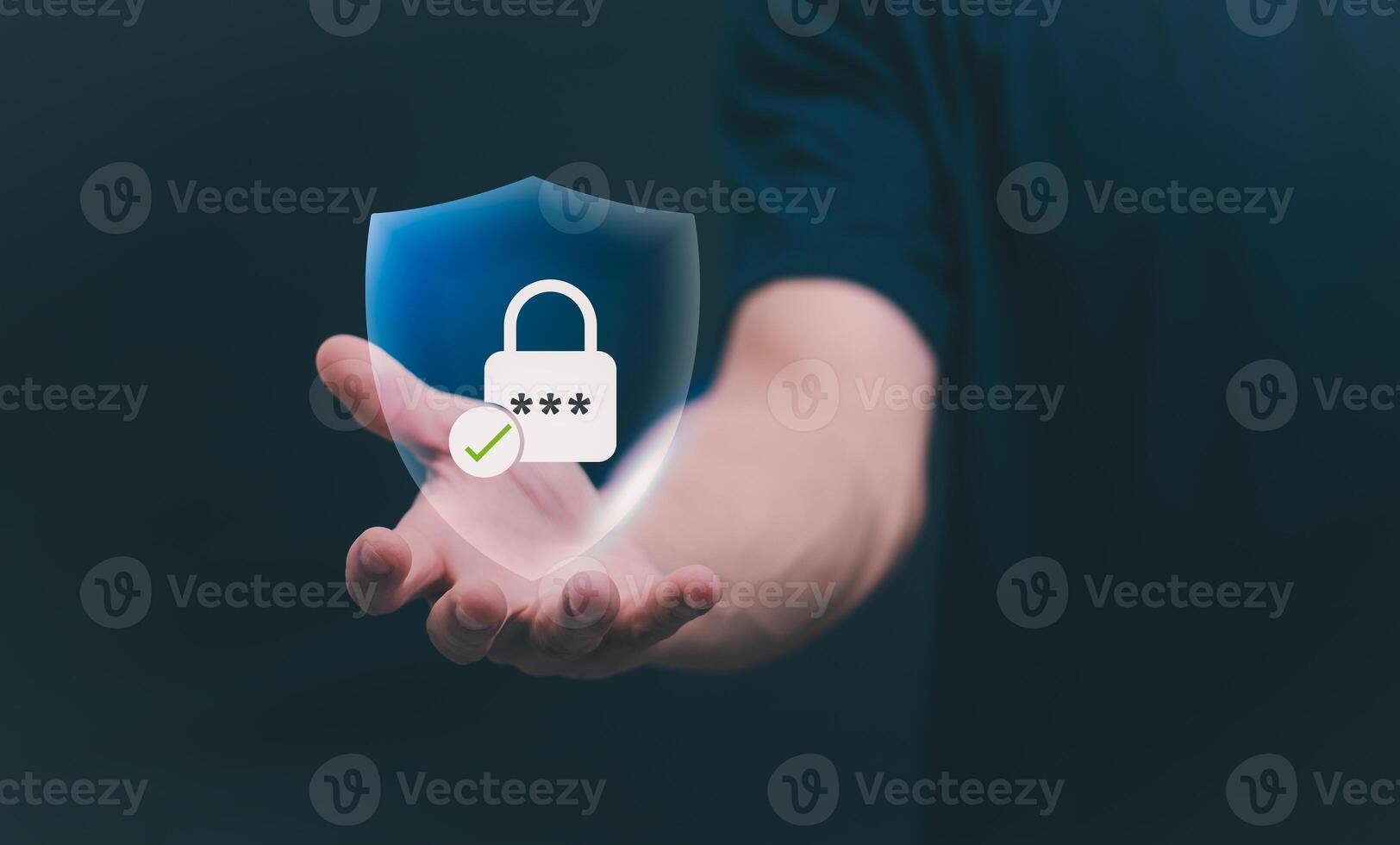 a man holding a shield with a padlock icon on it photo