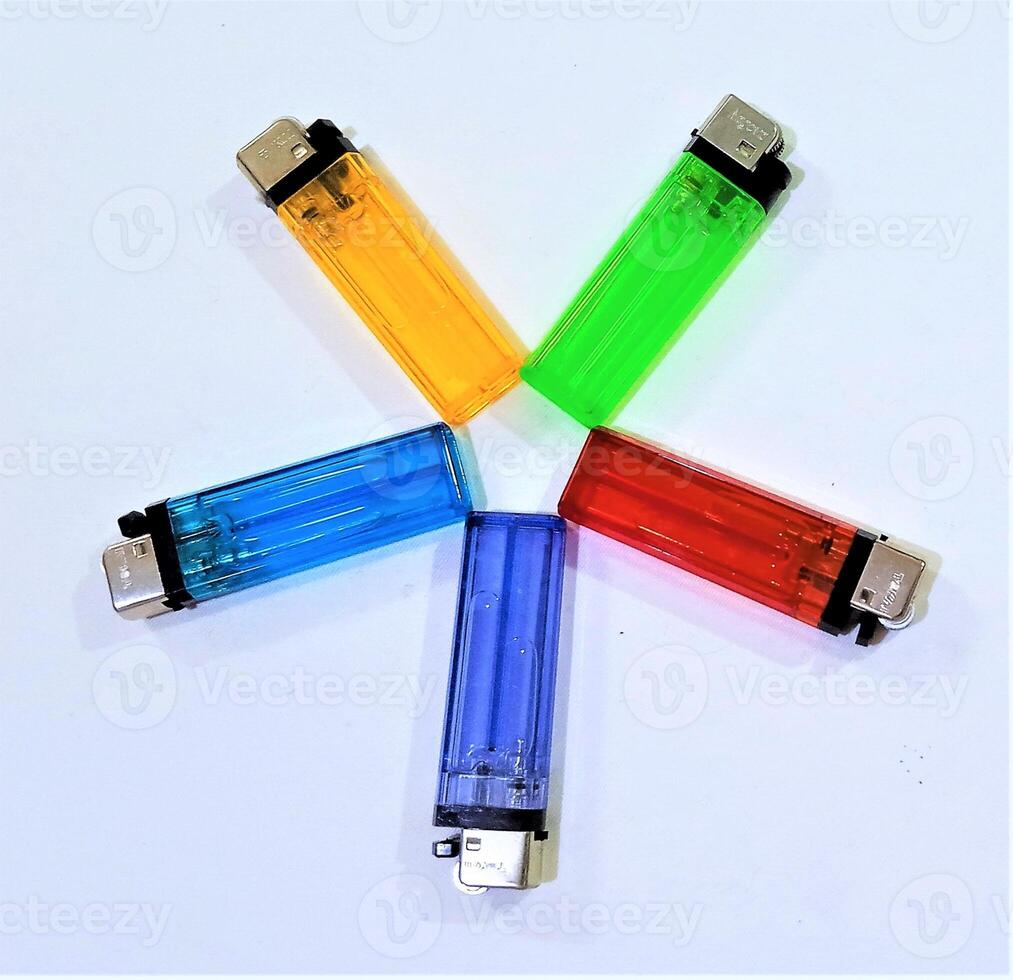 Gas lighters use liquids such as naphtha or butane, the size of the flame can be adjusted so that it is not dangerous photo