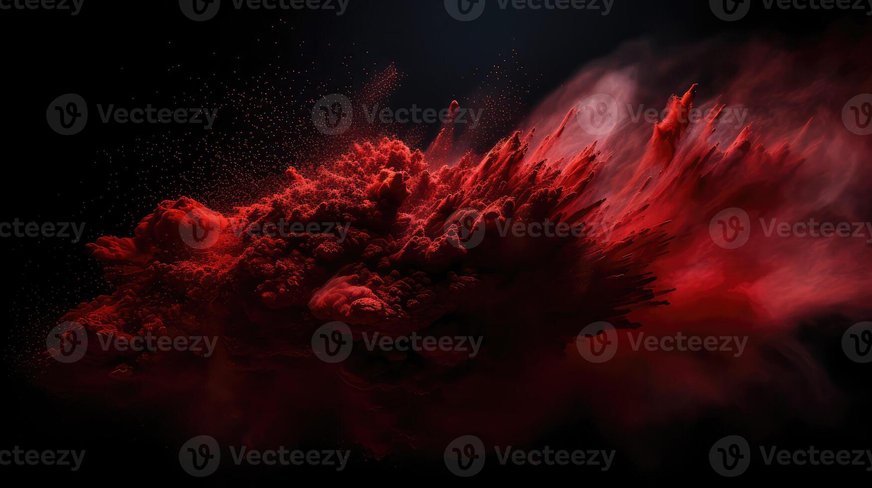 vibrant red dust on black background photo