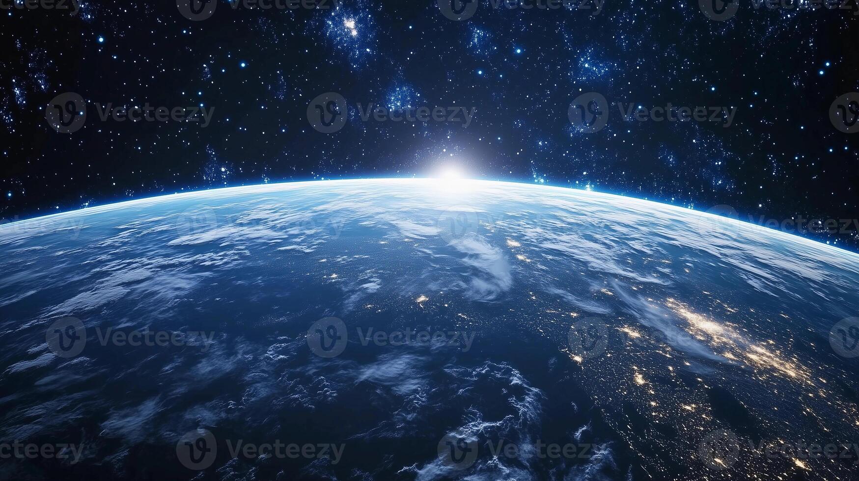 A beautiful view of the Earth from space, with the sun shining brightly on the planet. The stars are scattered throughout the sky, creating a serene and peaceful atmosphere photo