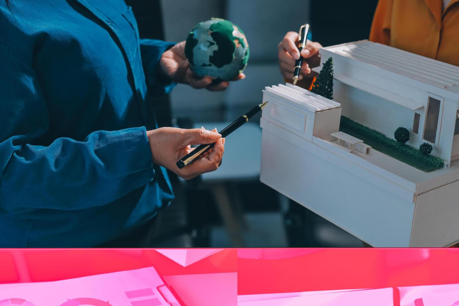 Two images of people holding a model of a house photo