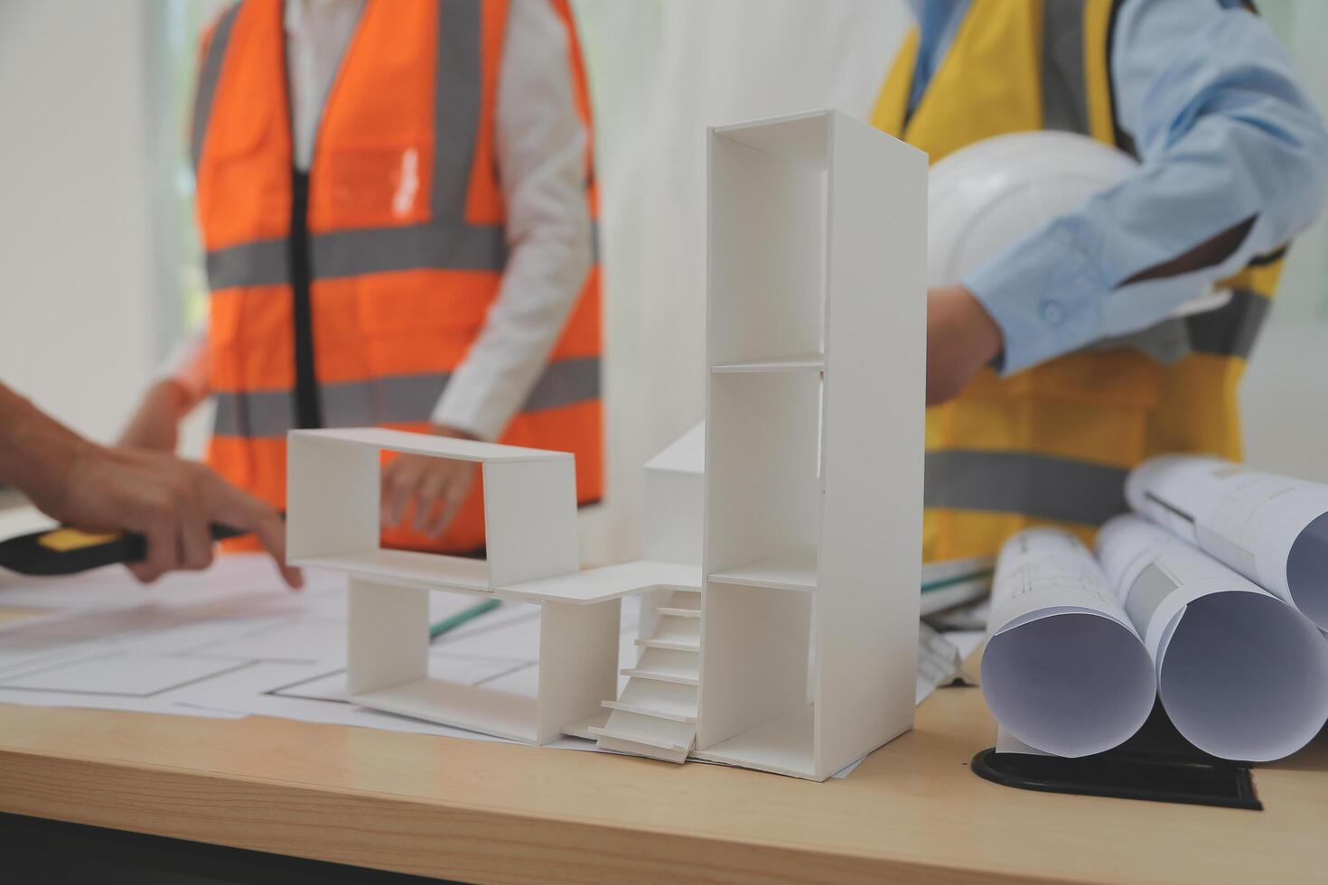 A group of people working on a construction project photo