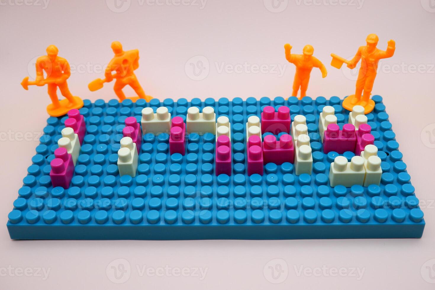 Mini Workers on 1 May Bricks Work and Dedication Theme photo