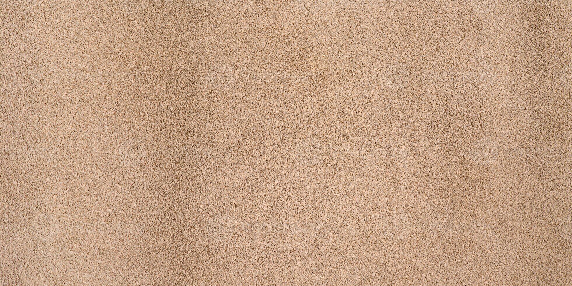 Brown suede background. Beige suede texture web size. photo
