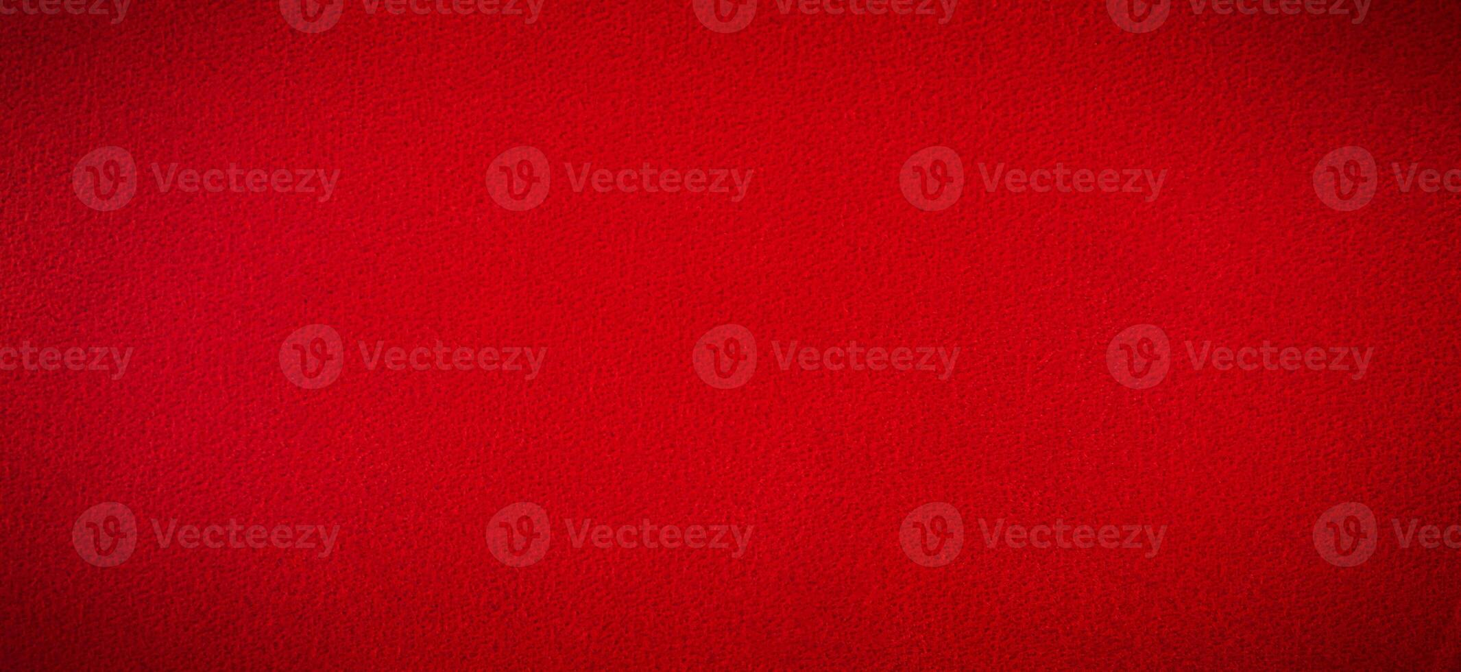 Red suede as a background with a vignette banner size. photo
