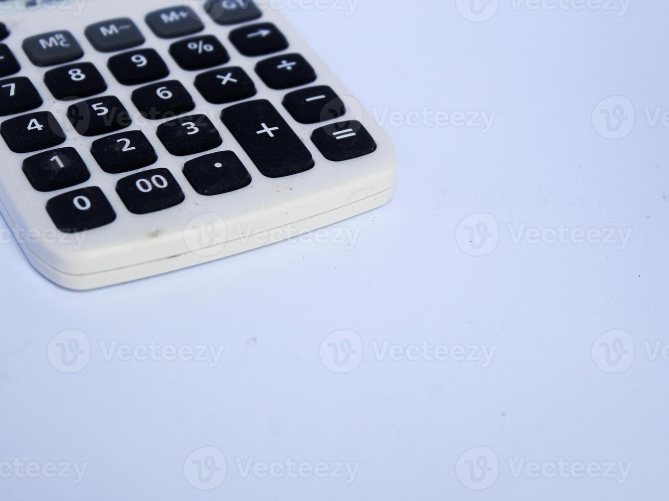 detail of numeric keypad on calculator isolated on white background photo