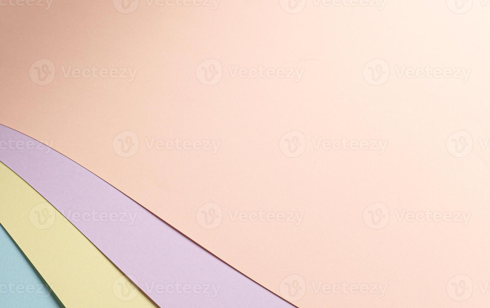 Pastel abstract geometric paper background featuring a multicolored composition in peach, lavender, photo