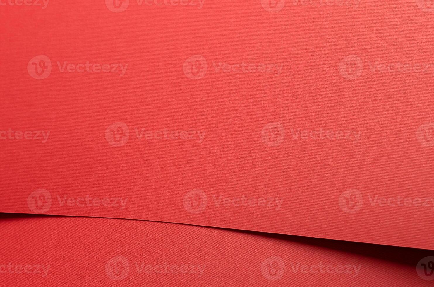 Crimson red paper background with a matte texture and soft tones. Rich ruby and maroon hues create a photo