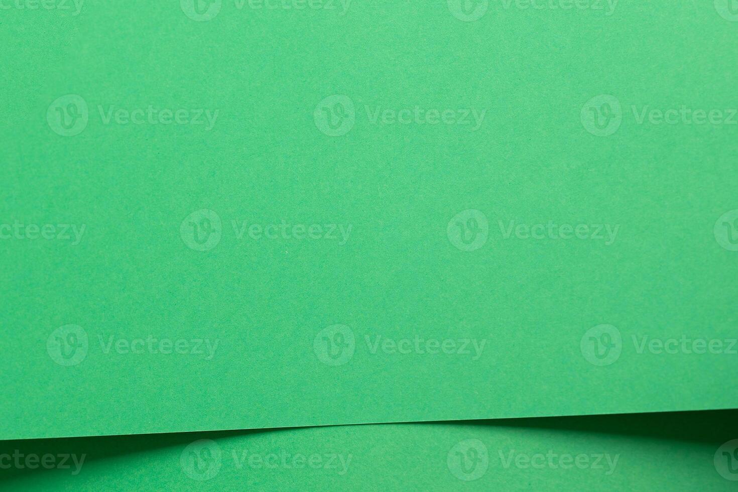 Eden green paper background with smooth, layered sheets and a fine matte finish. Vibrant, fresh photo
