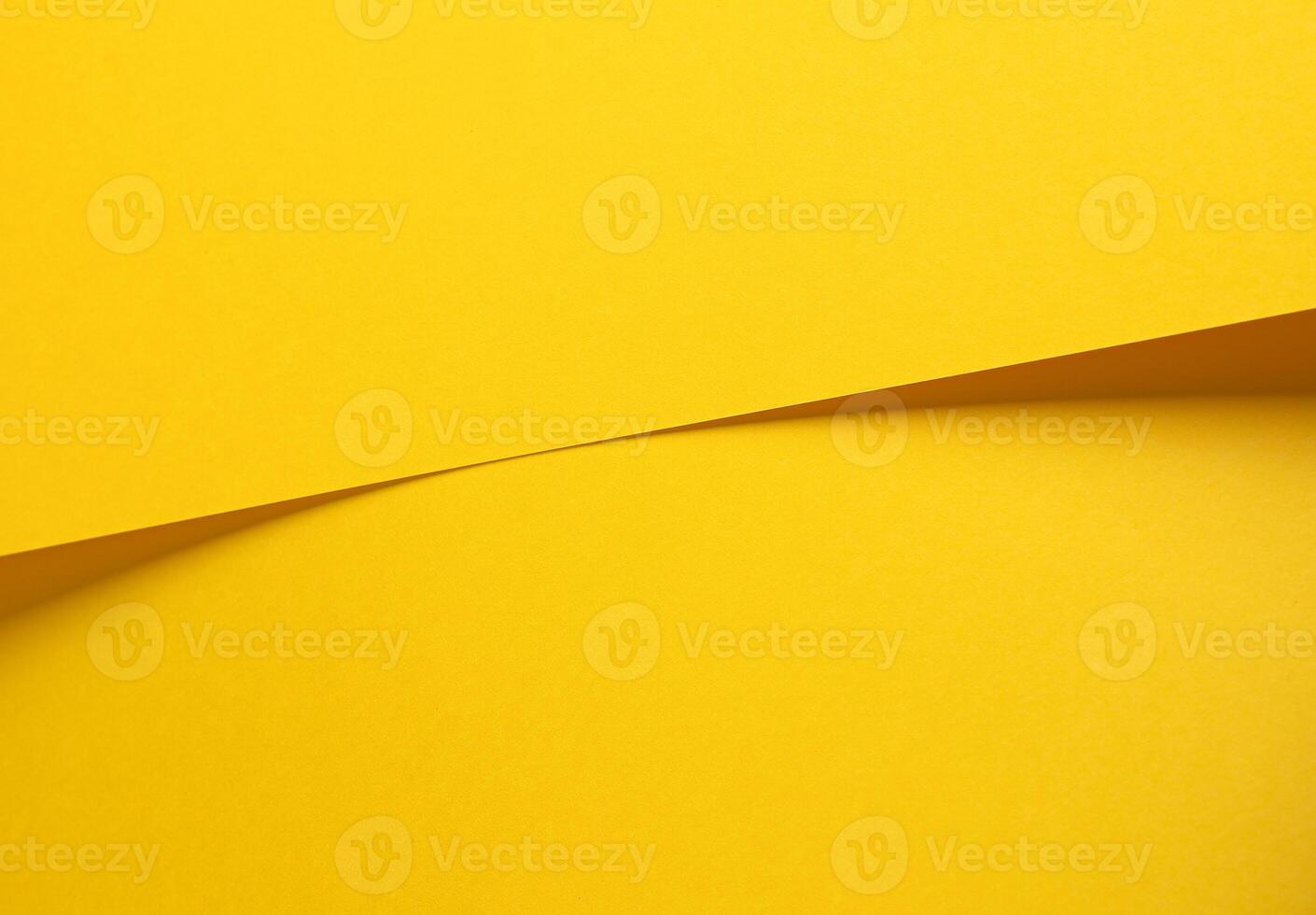 Lemon yellow paper background with a smooth matte surface and a radiant finish. Bright, sunny tones photo