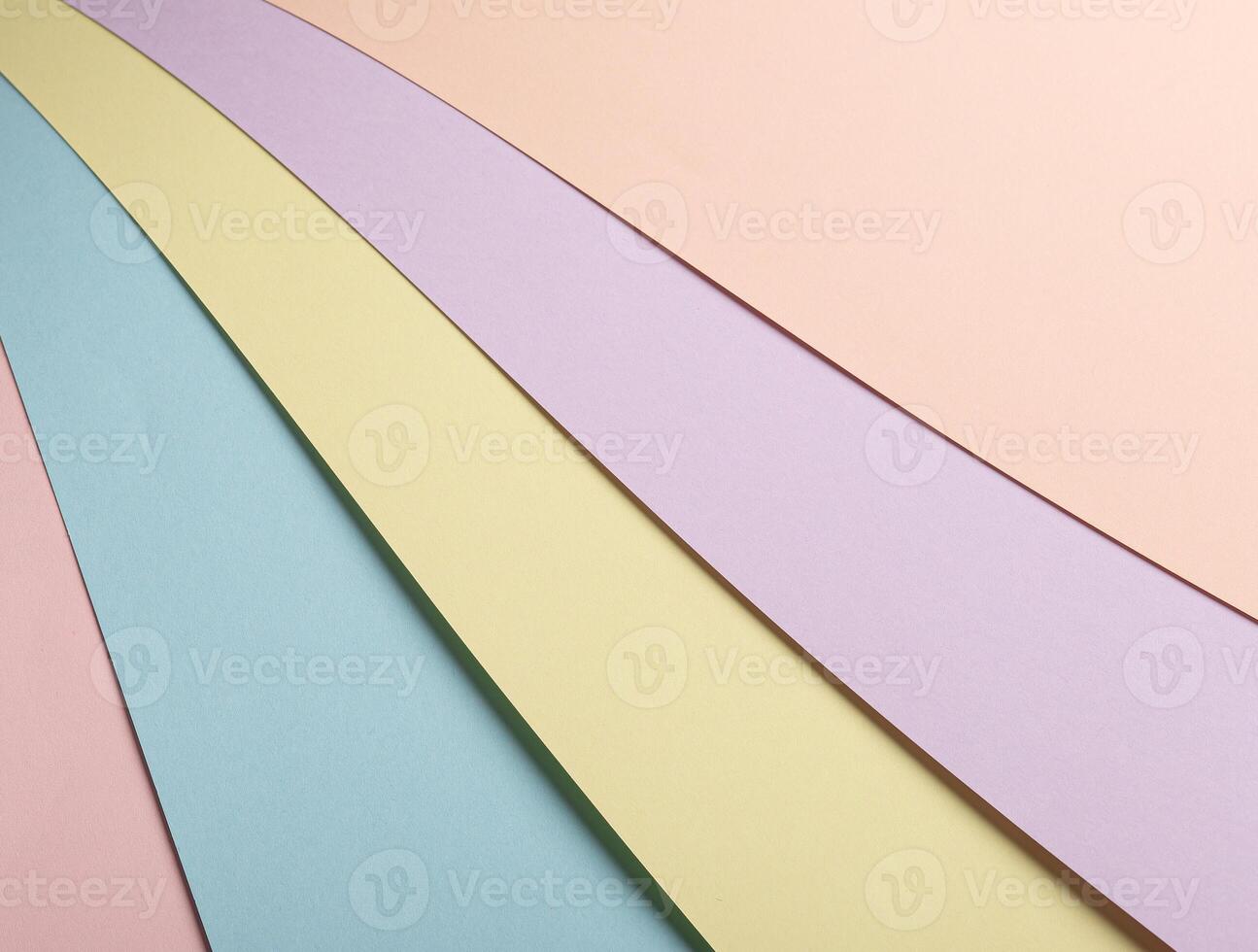 Pastel abstract geometric paper background with striped patterns in pink, blue, yellow, lavender, photo