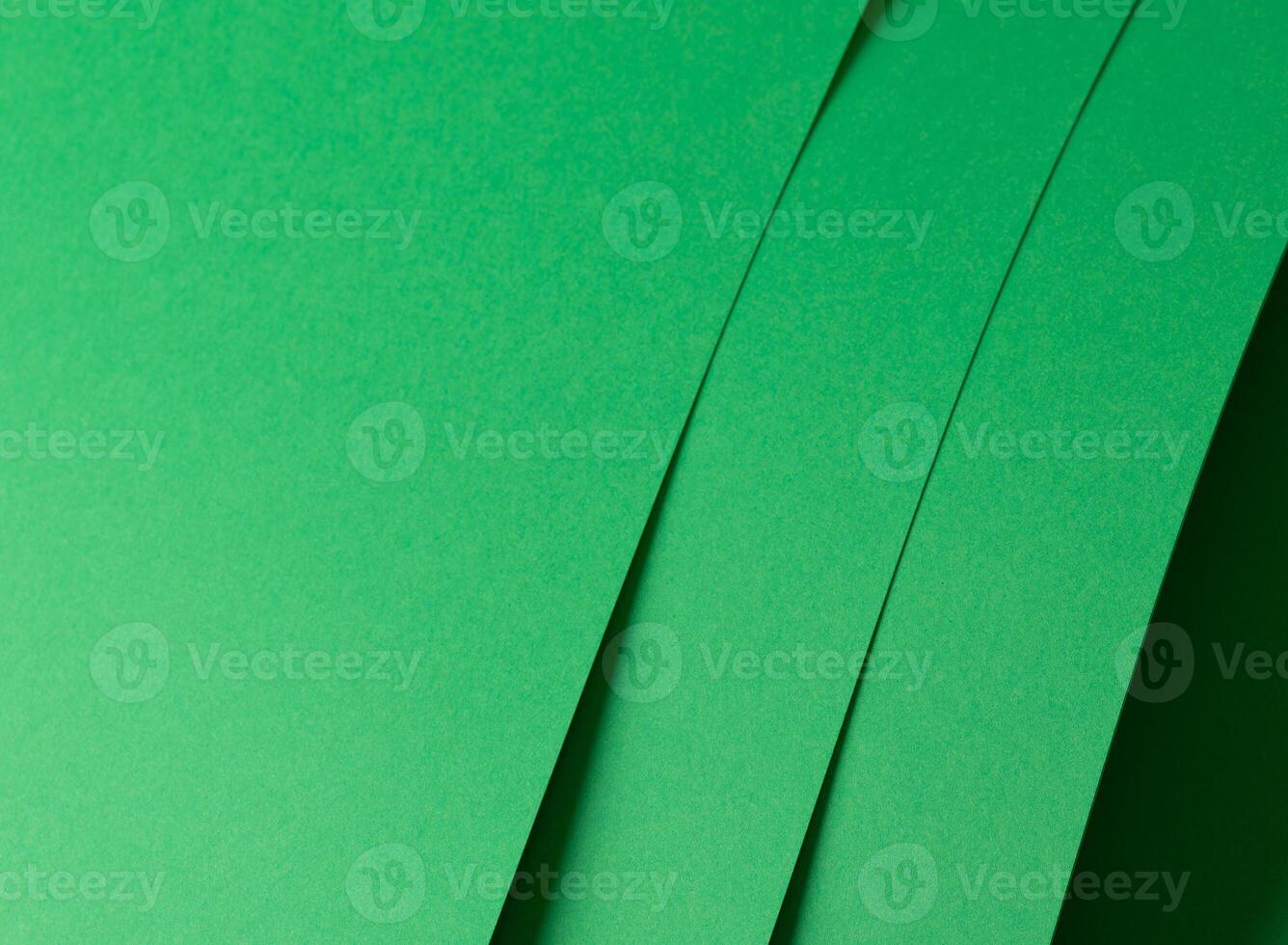 Eden green paper background with vertical, layered sheets and a smooth matte finish. Bright, vibrant photo