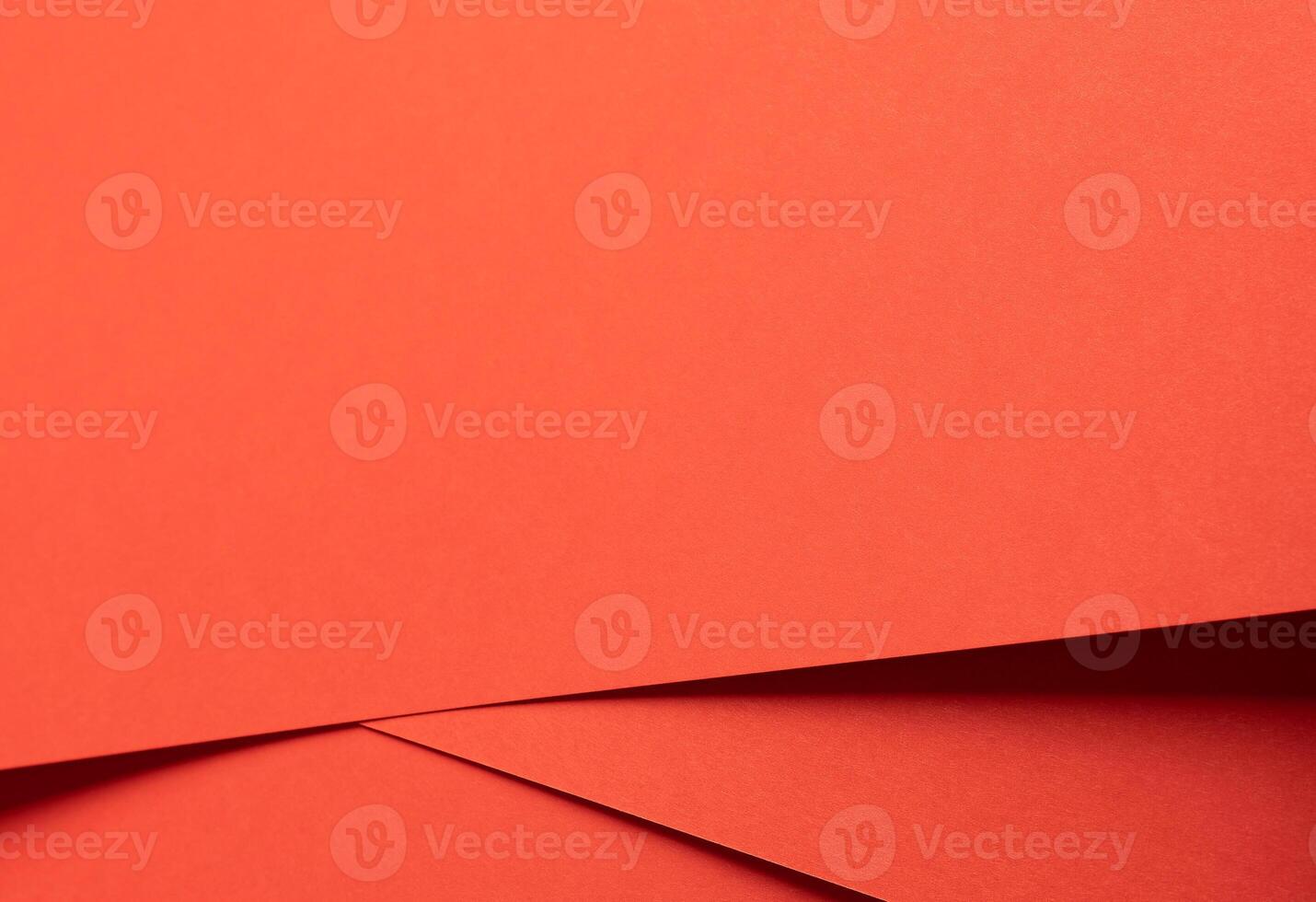 Fiesta red and orange paper background with a matte finish and smooth, layered textures. Warm, photo