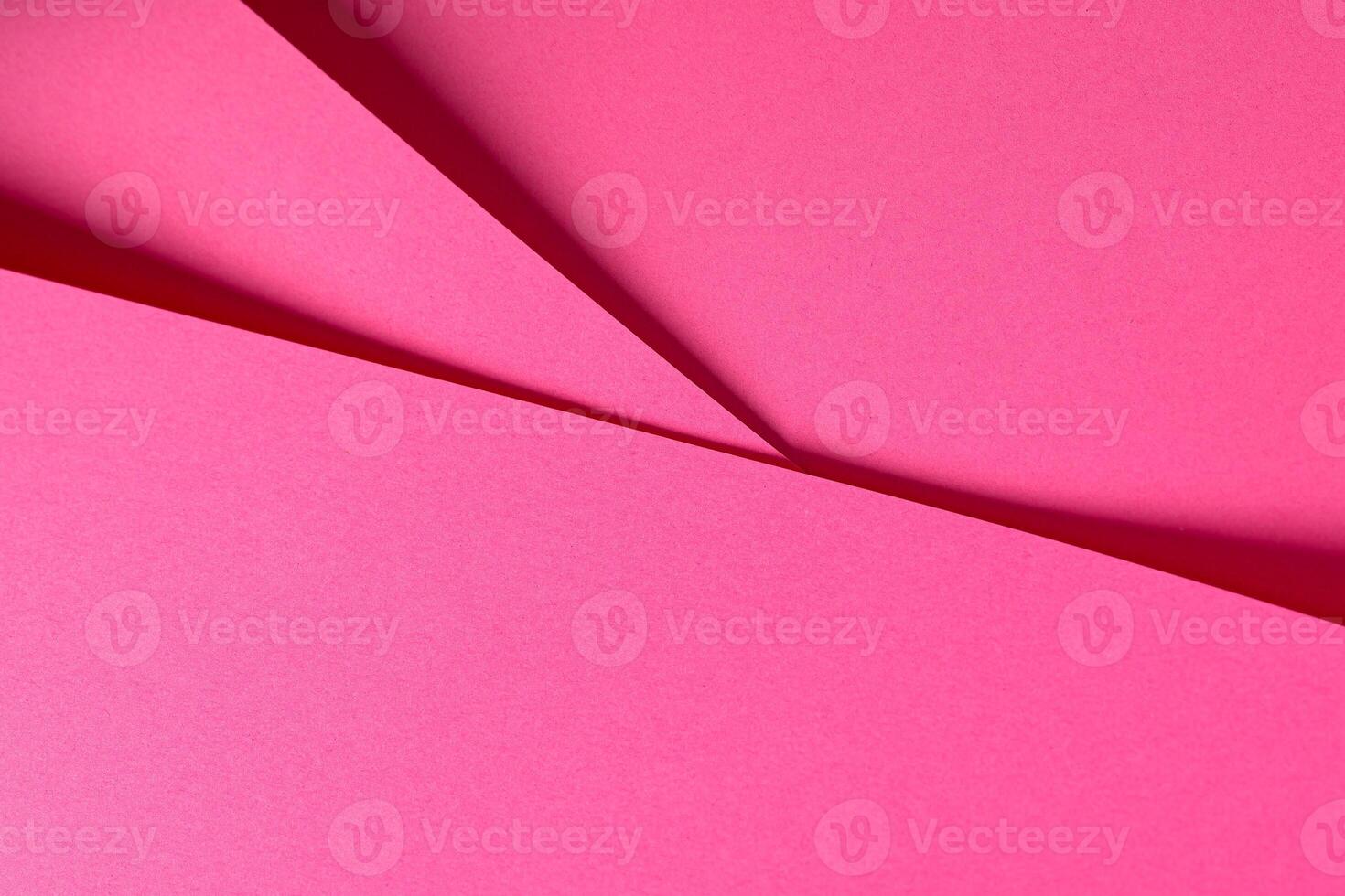 Pink yarrow paper background with a matte finish and subtle fibers creating a textured surface. Bold photo