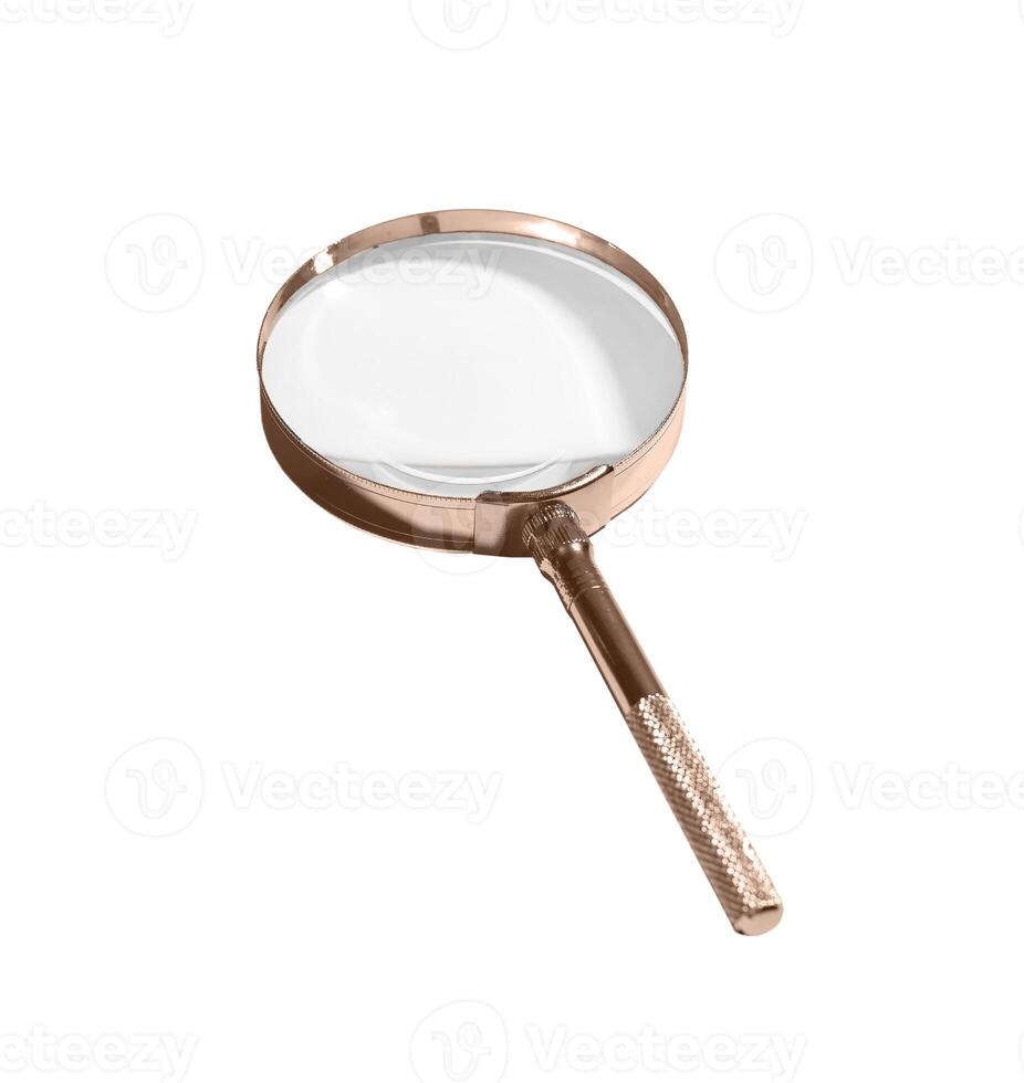 Magnifying glass with metal frame and lens tilted at an angle, used for study, inspection, and photo