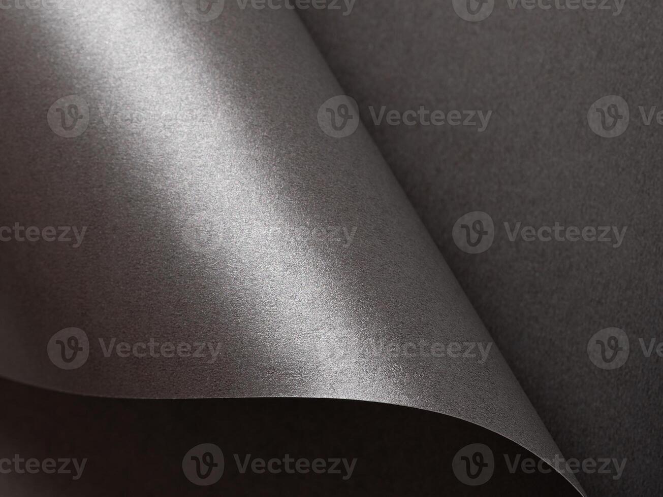 Graphite-textured paper background with a smooth, monochrome surface, subtle gradient, and elegant photo