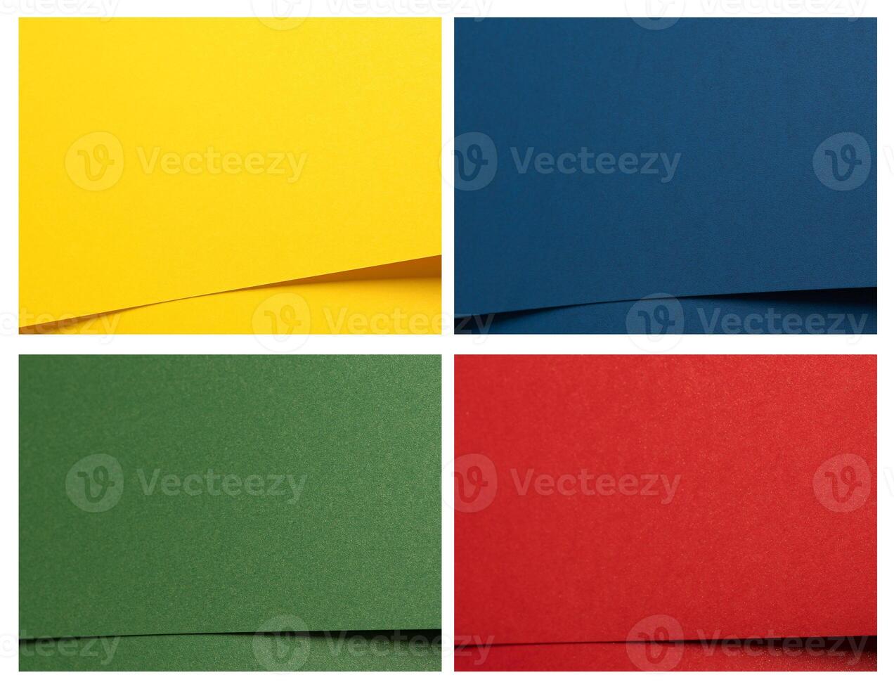 Colorful paper background featuring bold overlapping layers in yellow, blue, red, and green. Smooth photo