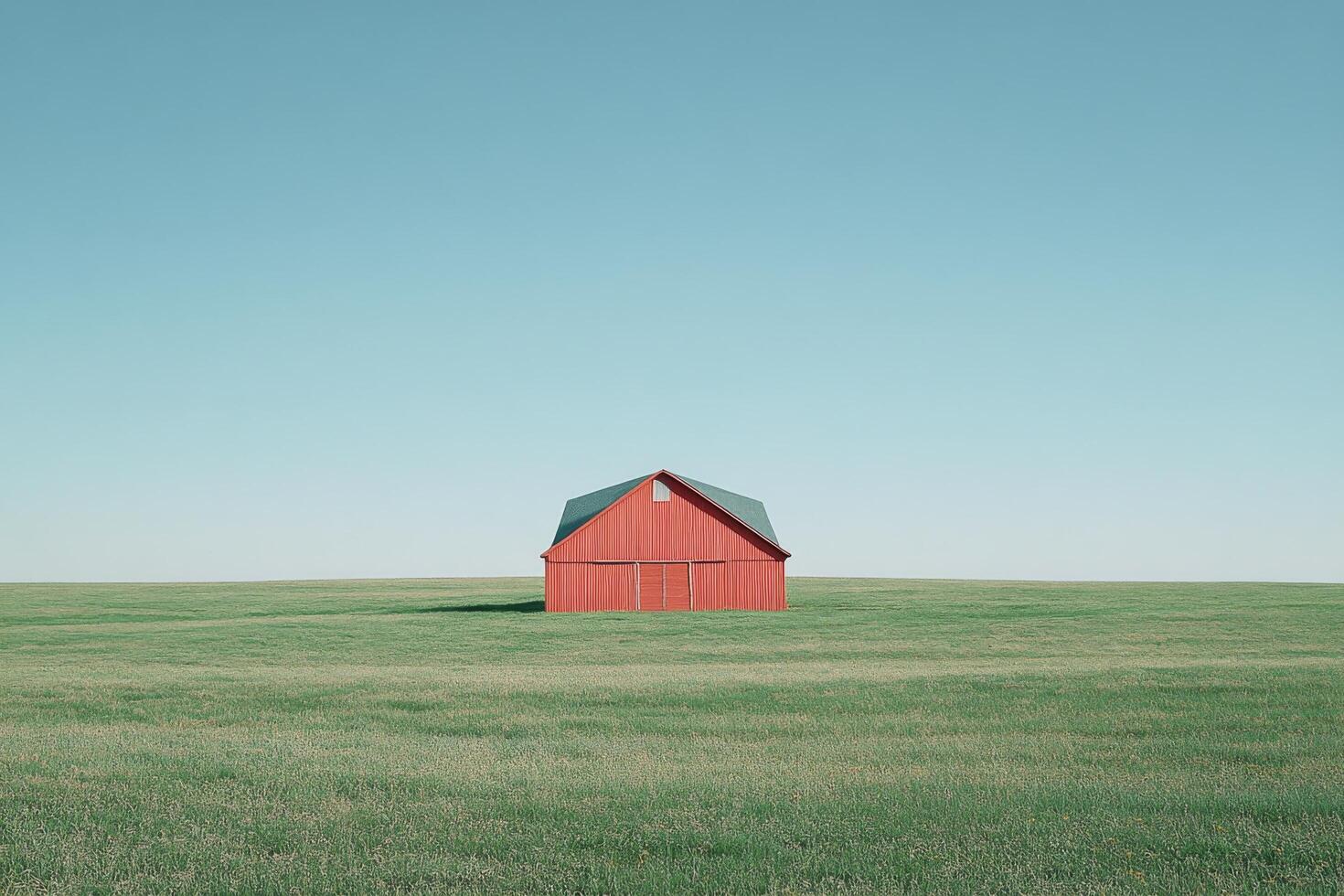 A red barn in a field photo