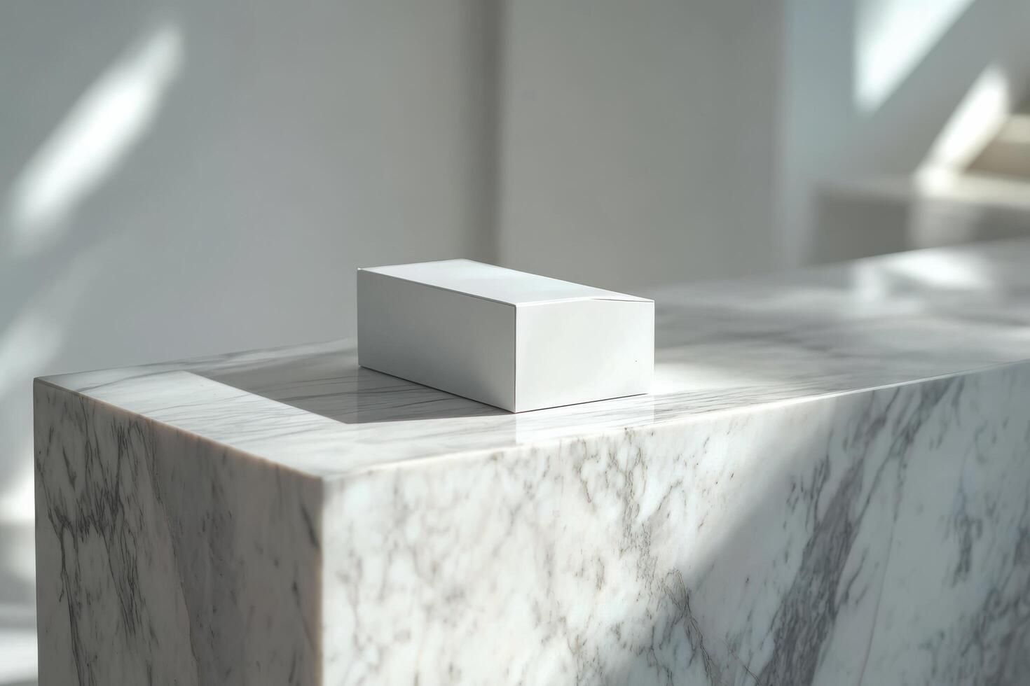 A white cube sitting on top of a marble counter photo