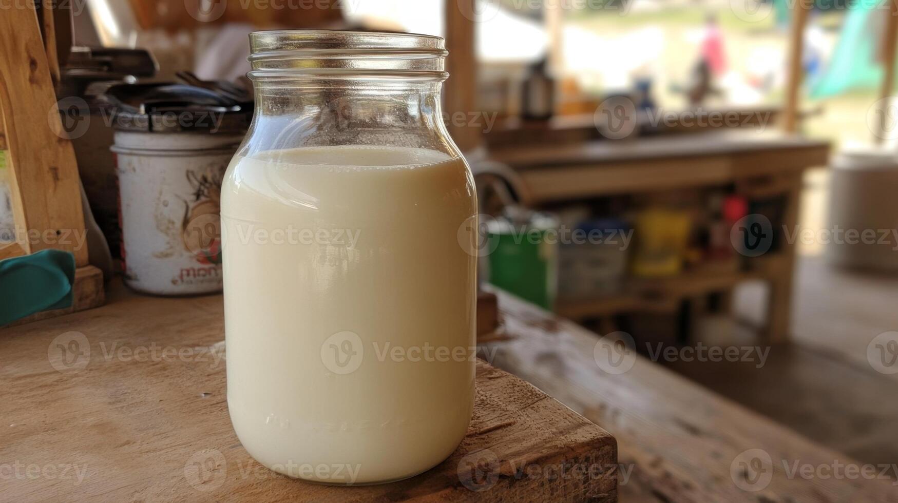 Fresh Dairy Milk in a Glass Jar photo