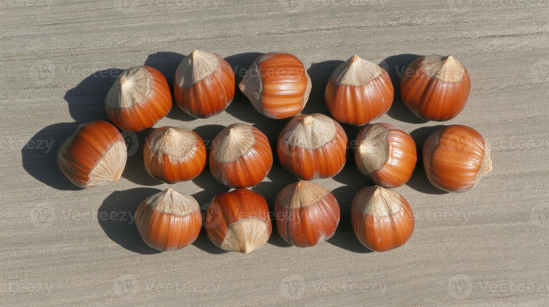 Close Up of Hazelnuts on a Wooden Surface photo