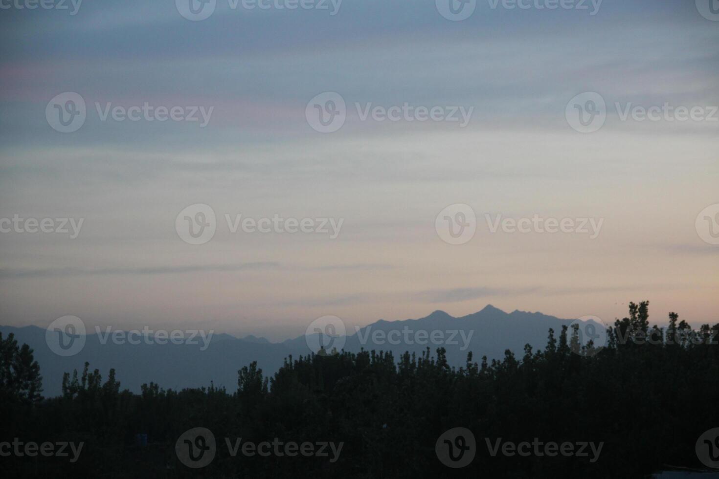 A view of mountains from a distance photo