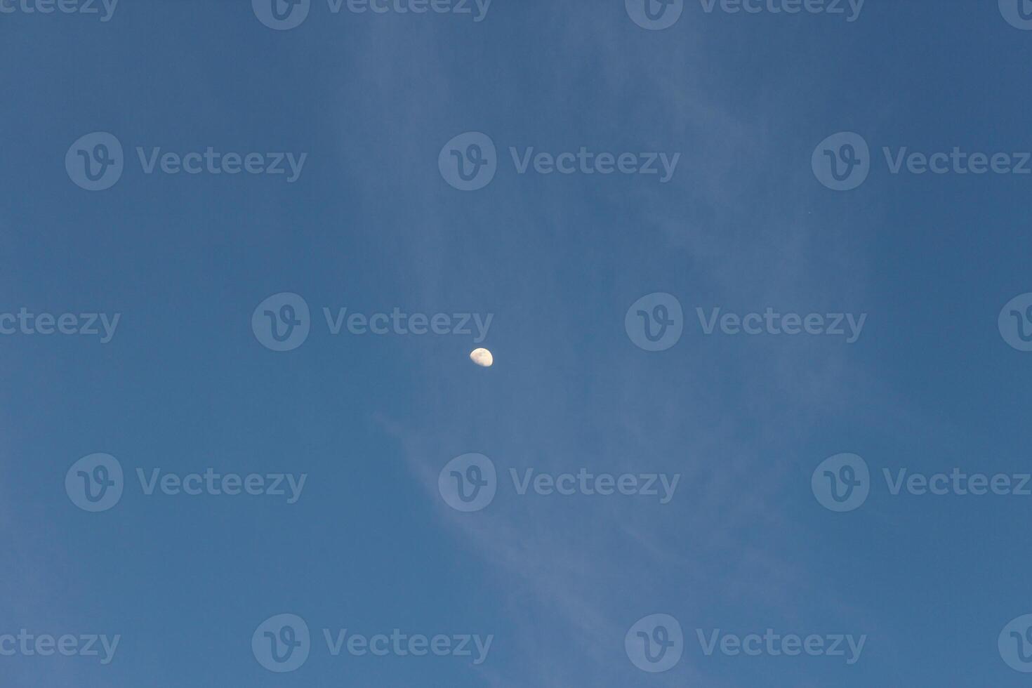 A plane flying in the blue sky photo
