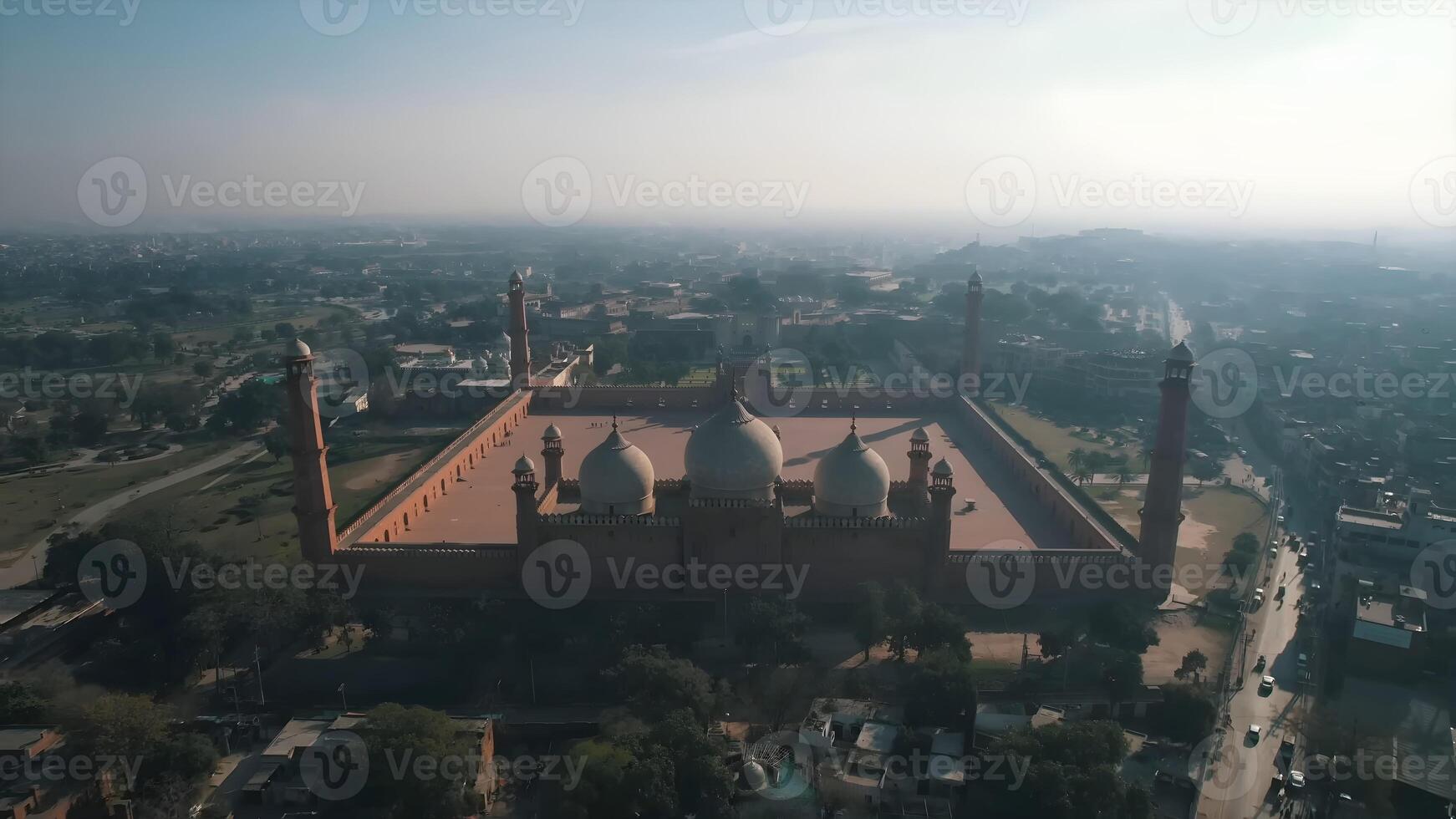 Aerial View of the Majestic Badshahi Mosque in Lahore, Pakistan, Under a Clear Sky photo