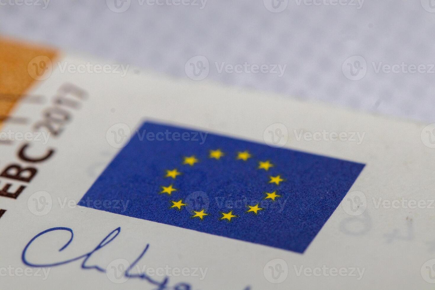 Close-up of European Union Flag and Partial Text on Document photo