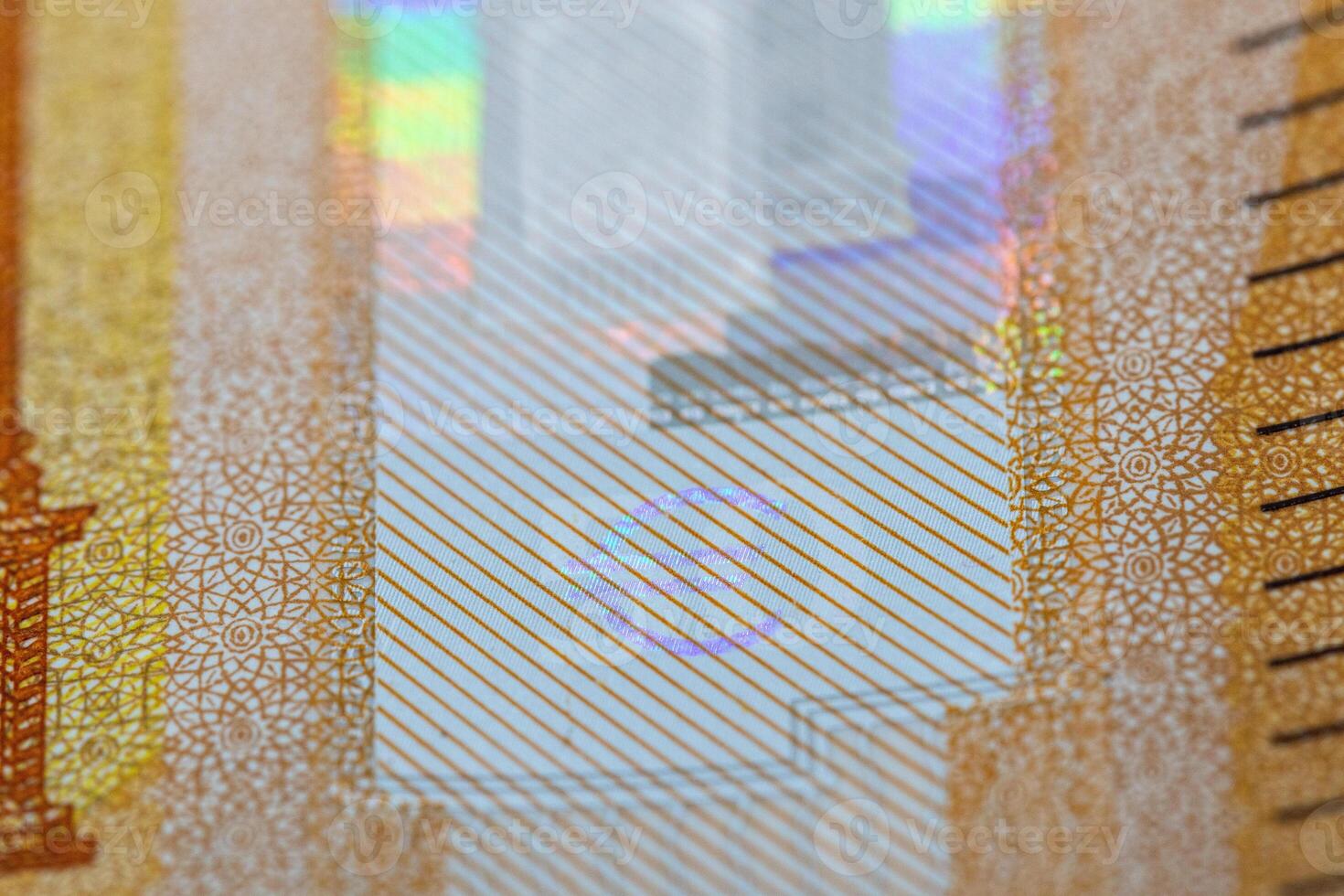 Close-up of Banknote Security Feature with Euro Symbol photo