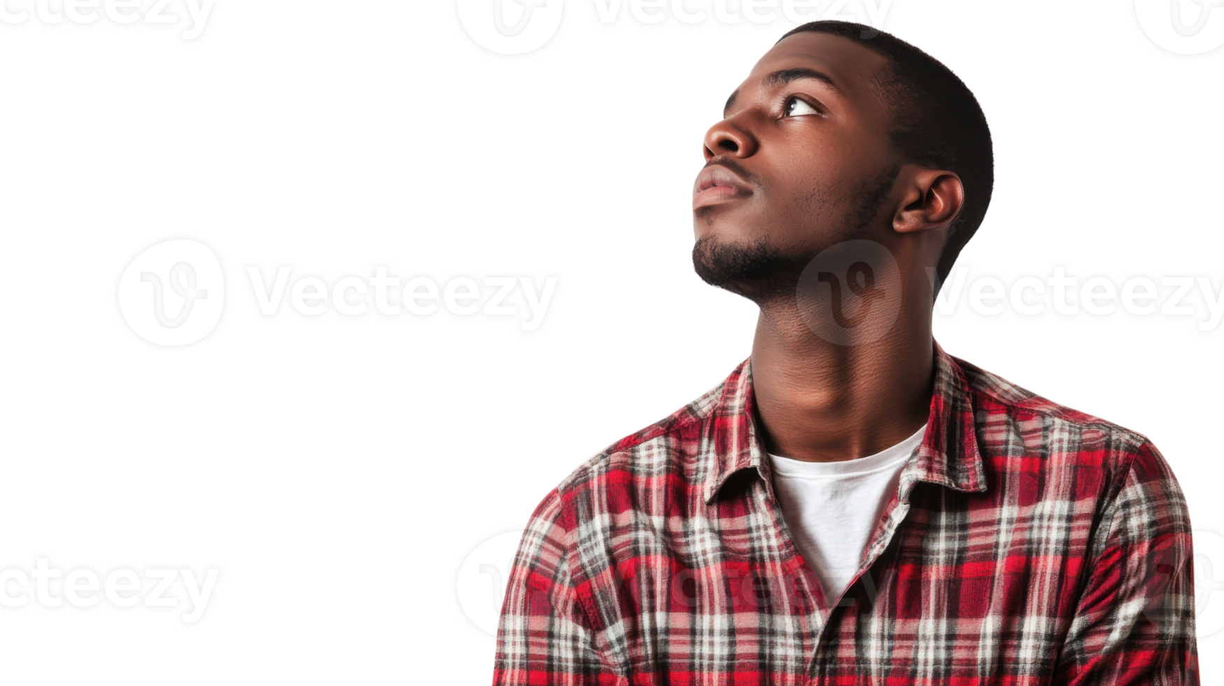 Man gazes thoughtfully upward in a studio setting with neutral background during a modeling session png
