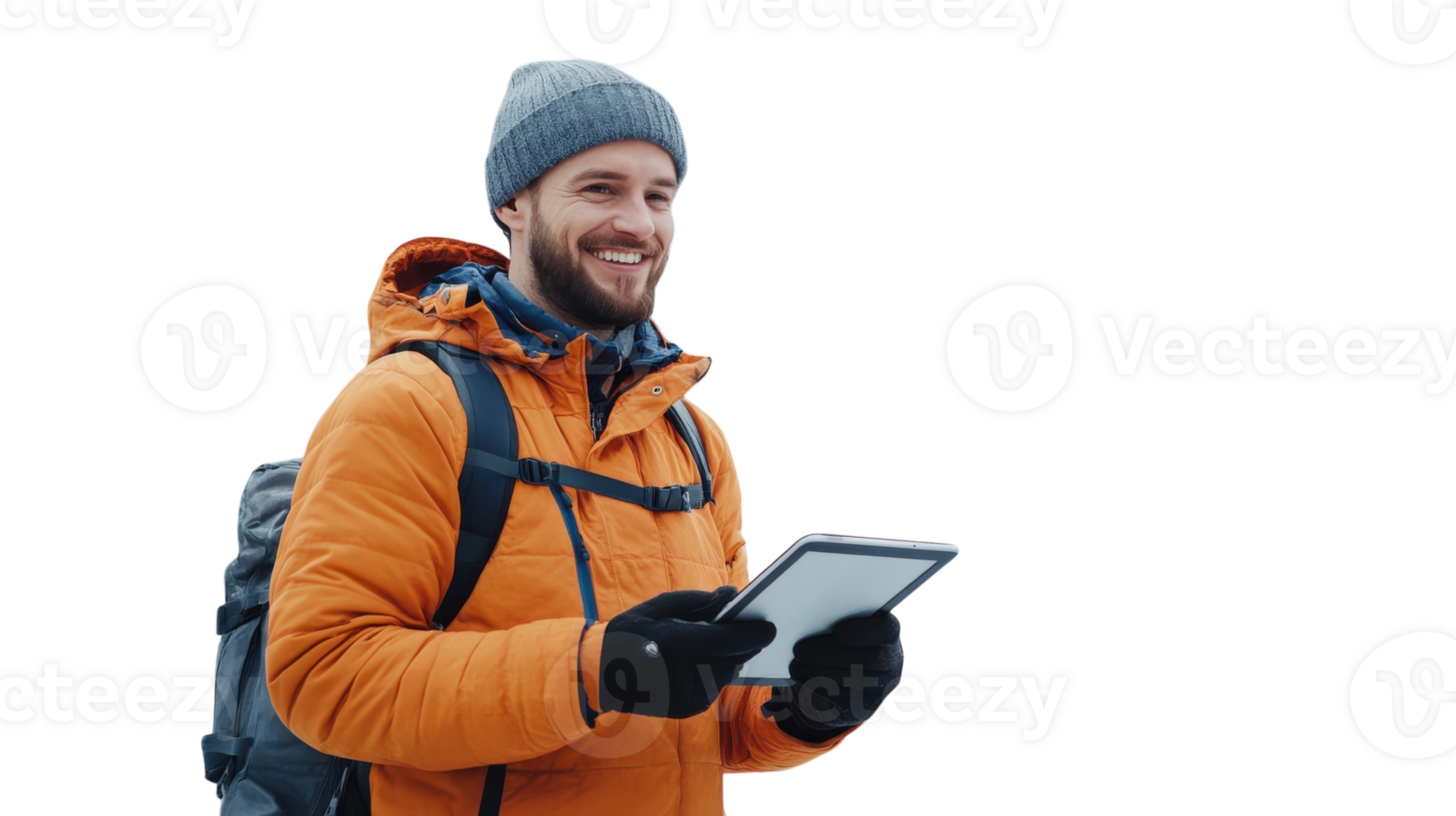 Man with a tablet smiles in snowy mountains during a bright winter day png