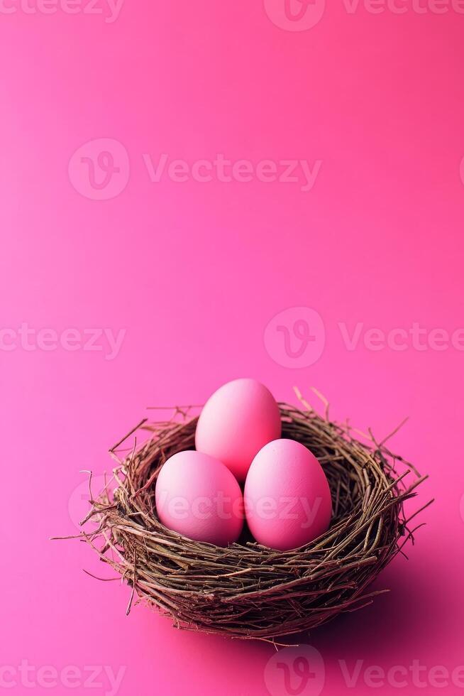 Soft pink eggs nestled in a rustic bird's nest on a vibrant magenta backdrop exuding warmth and tranquility photo
