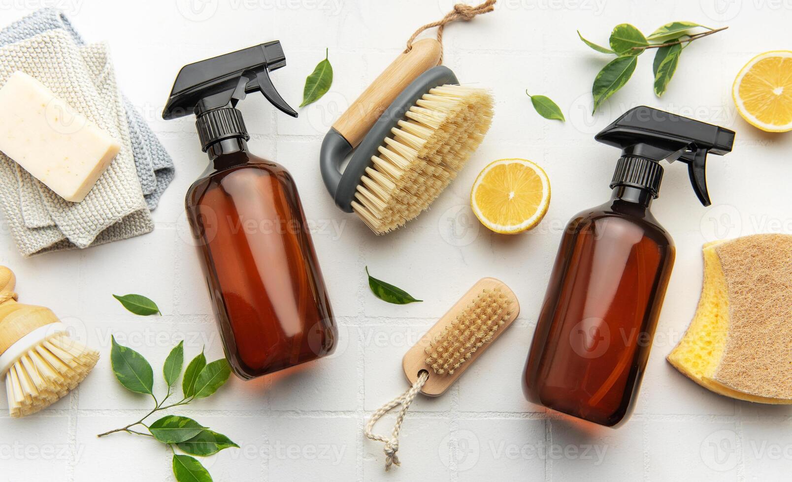 Eco friendly cleaning products promoting sustainable lifestyle with natural ingredients flat lay photo