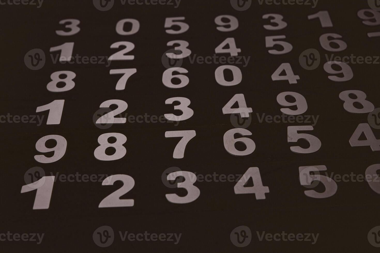 Abstract Mathematical Numbers on a Dark Background photo