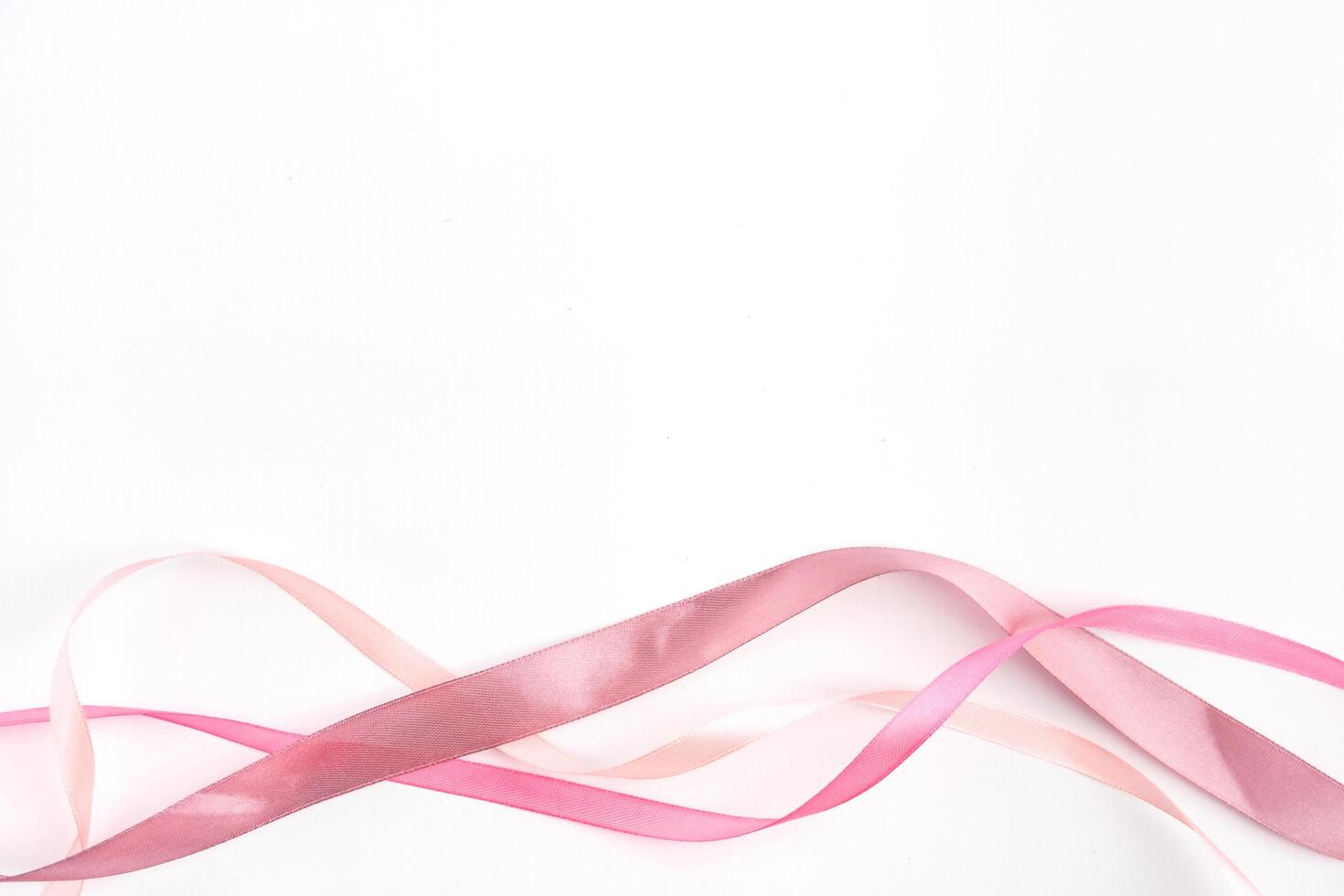 pink ribbon isolated cut out white valentine romantic background empty space photo