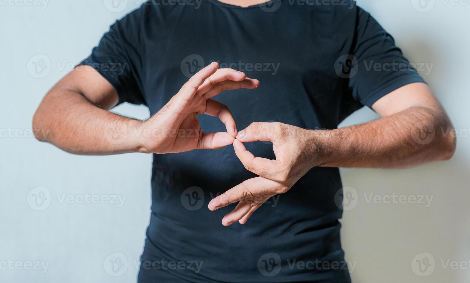 People speaking in sign language isolated. Young woman gesturing in sign language photo
