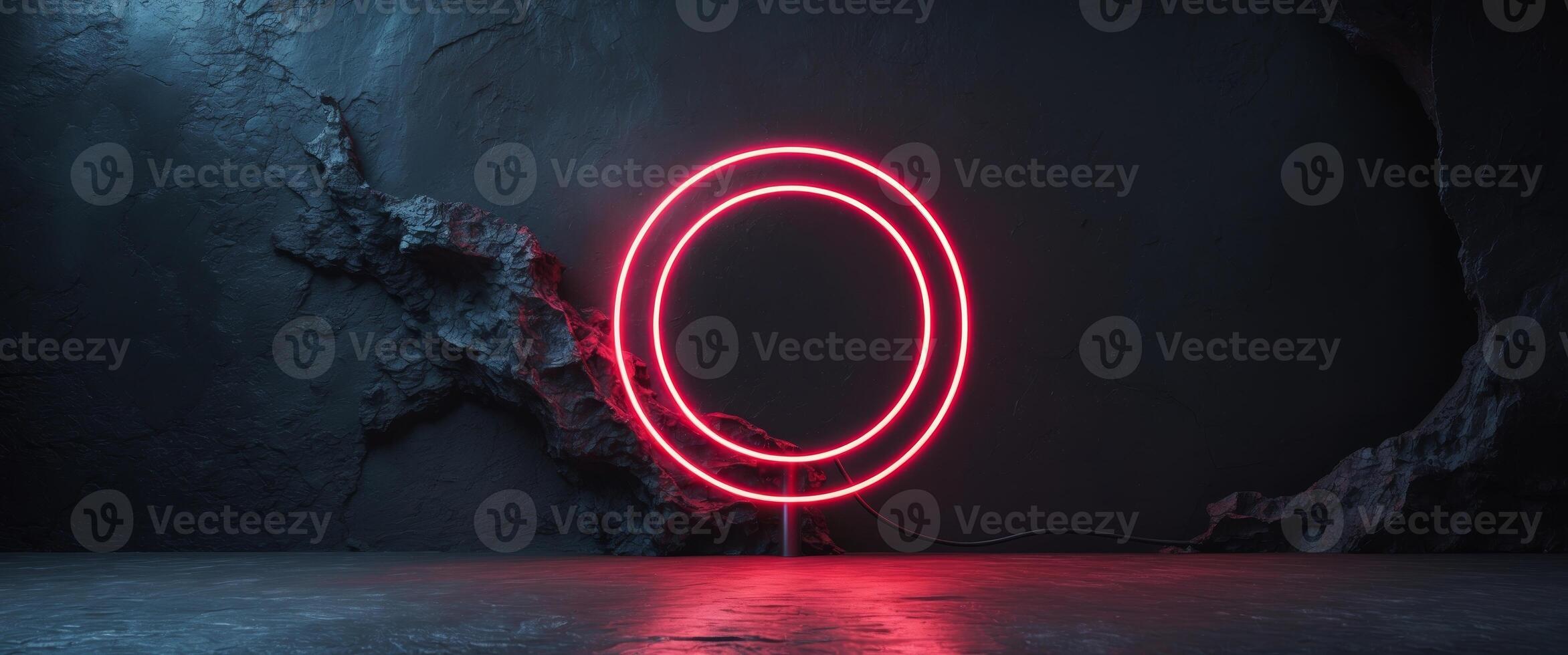 Illuminated red neon circle on textured dark background. photo