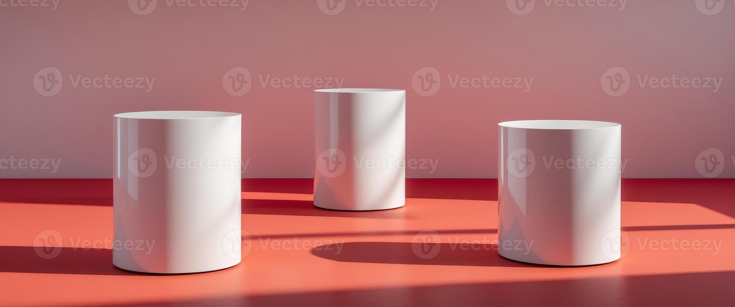 Three white cylinder podiums on red background photo