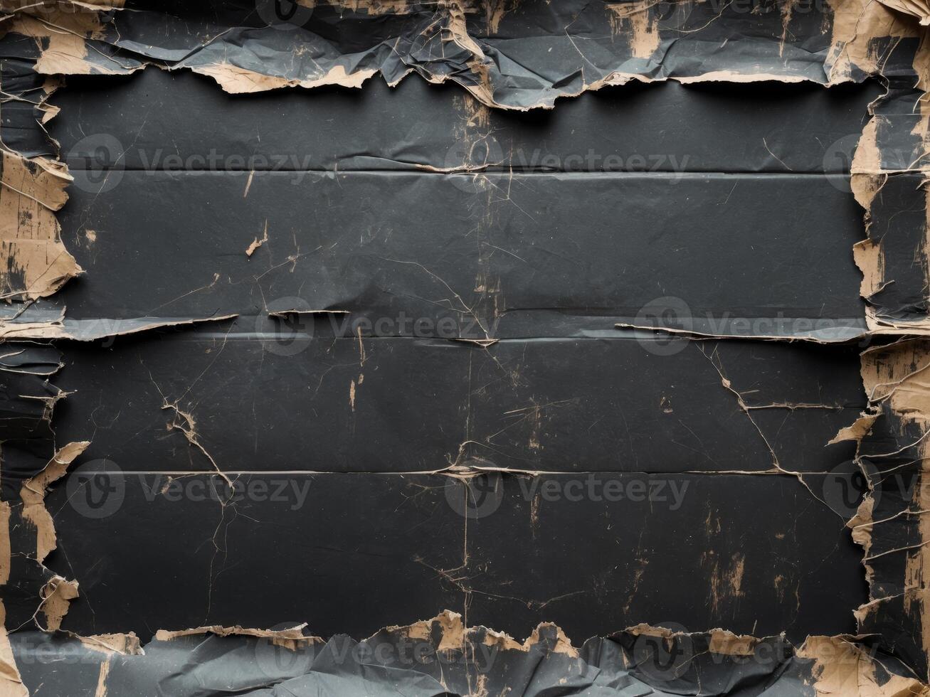old black empty ripped folded torn cardboard paper poster grunge scratched old shabby surface distressed overlay texture for collage. photo