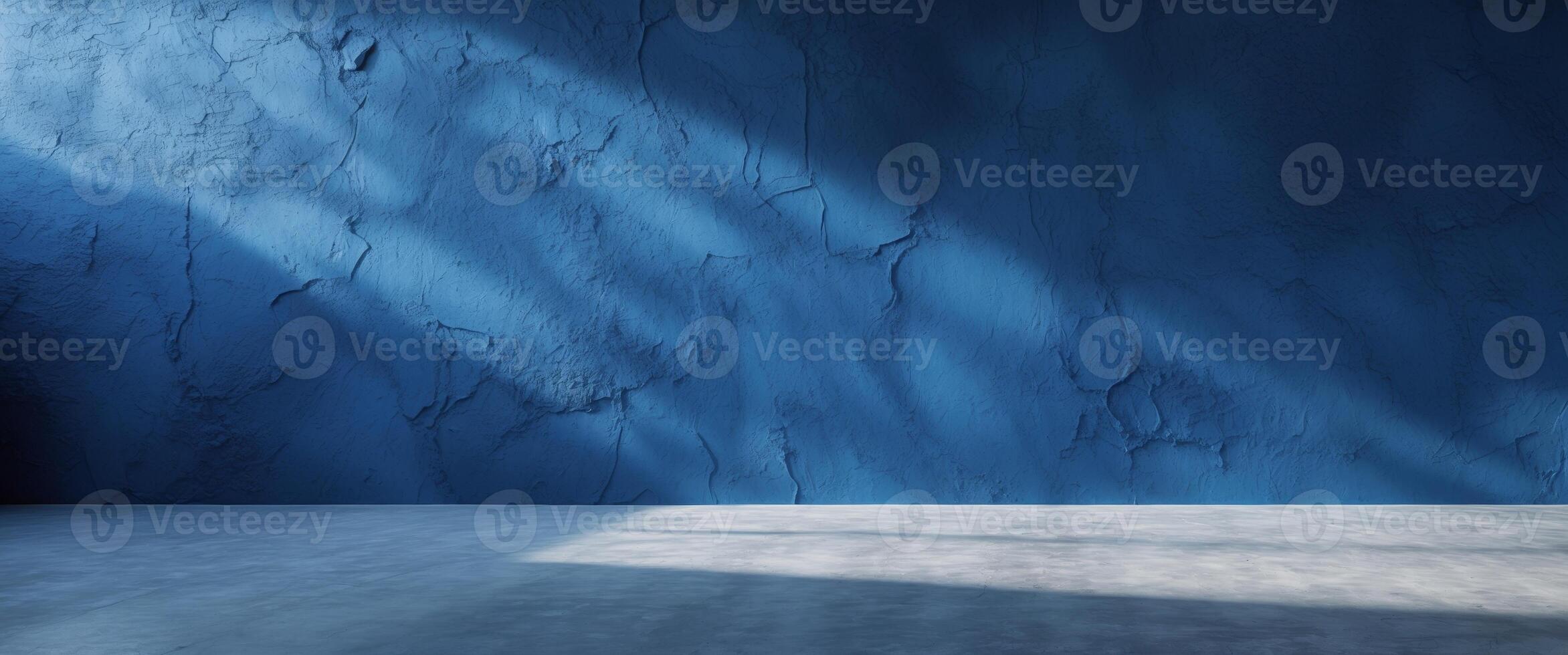 Vibrant deep blue textured wall creates a stunning backdrop for design projects with a bold and captivating aesthetic. photo