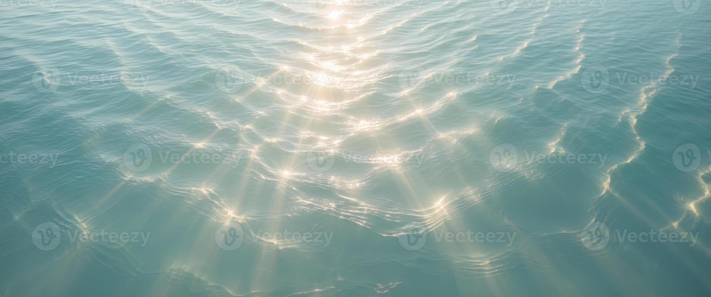 Mysterious ocean surface aerial view of underwater light rays and serenity. photo