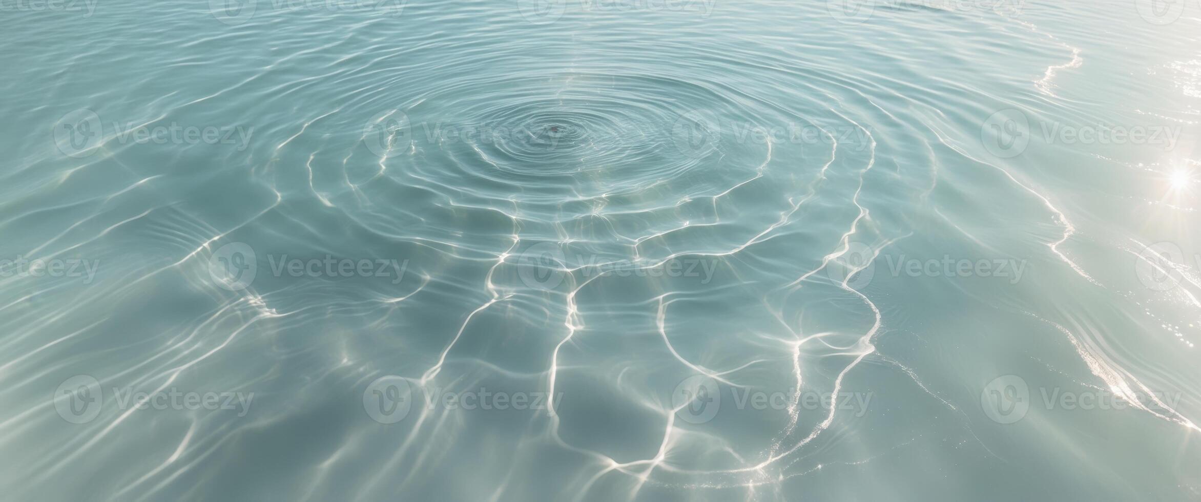 Mysterious ocean surface aerial view of underwater light rays and serenity photo