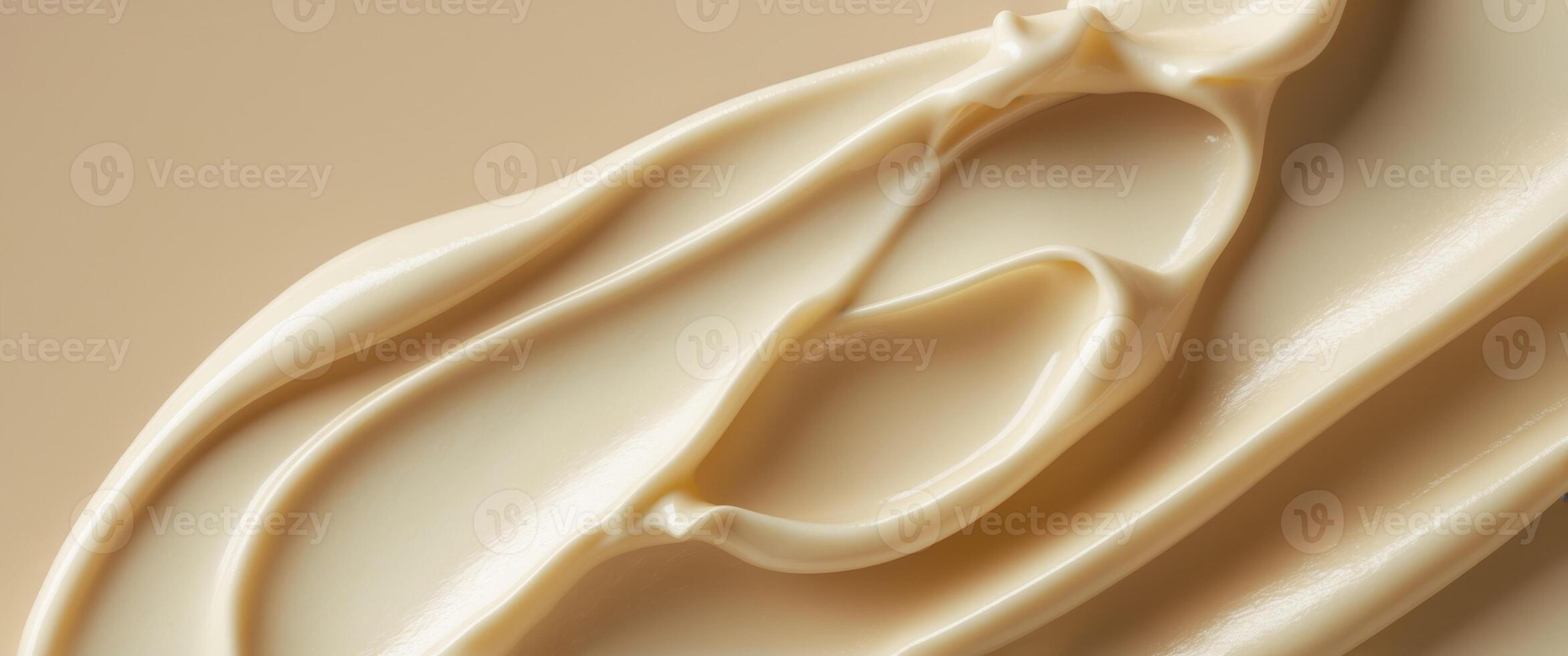 Closeup of Creamy Butter Texture on Beige Background Smooth Swatch for Beauty Skincare Design. photo
