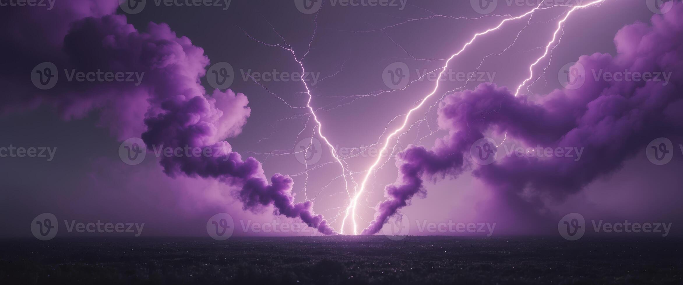 a dramatic frame of purple smoke and lightning strikes on a dark background photo