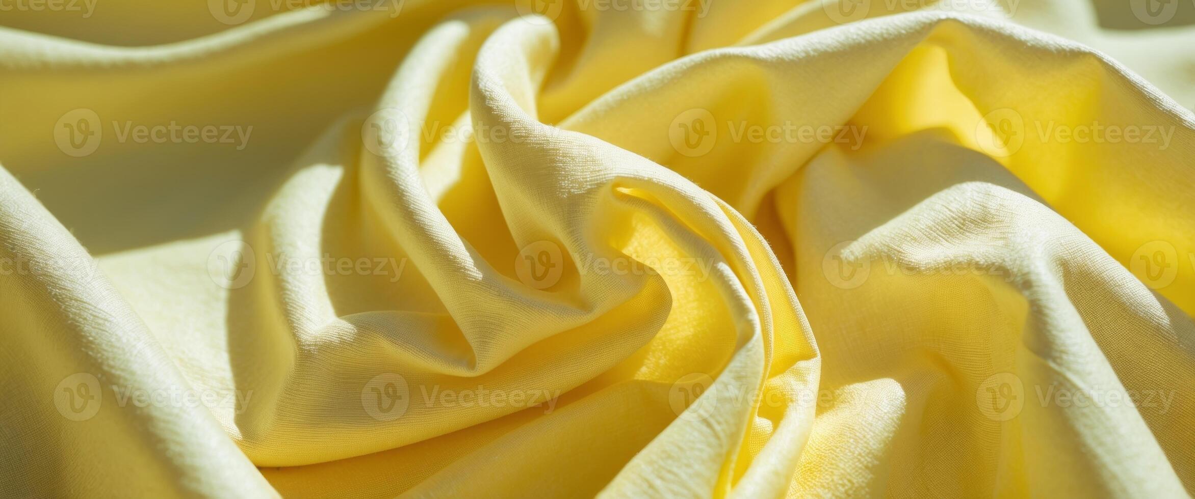 Bright yellow crumpled fabric showcasing texture and color in natural light photo